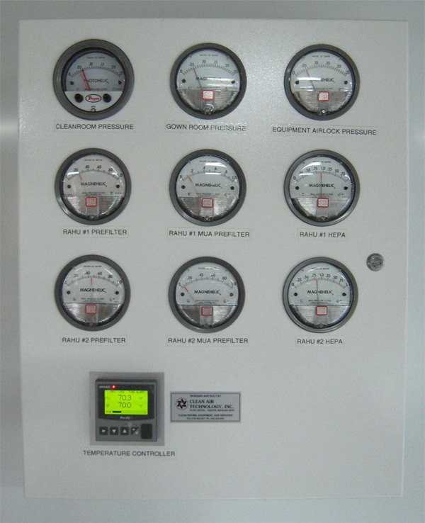 panel with monitors showing pressure